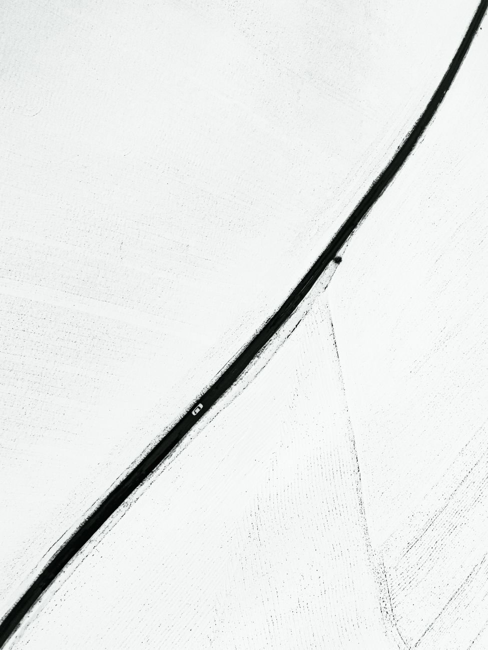 minimalist snowy road in golbasi turkiye